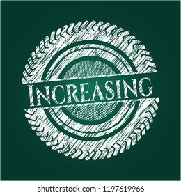 Increasing chalkboard emblem written on a blackboard