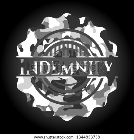 Indemnify written on a grey camouflage texture