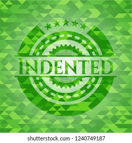 Indented green emblem. Mosaic background