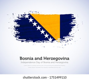 Independence day of Bosnia and Herzegovina country. Abstract flag in shape of paint brush stroke with shiny colored background