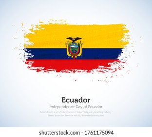 Independence day of Ecuador country. Abstract flag in shape of paint brush stroke with shiny colored background