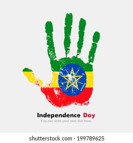 Independence Day. Grungy style. Hand print and five fingers. Used as an icon, card, greeting, printed materials.  Flag of Ethiopia