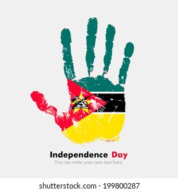 Independence Day. Grungy style. Hand print and five fingers. Used as an icon, card, greeting, printed materials.  flag of Mozambique