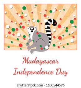 Independence Day in Madagascar. 26 June. Concept of a national holiday. Rays from below, lemur. Yellow background, grunge texture. Circles of flag colors - white, red, green