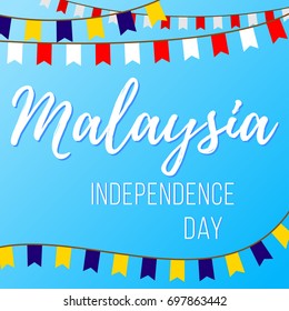 Independence Day in Malaysia. Vector illustration with inscription and garlands with flags on a blue background