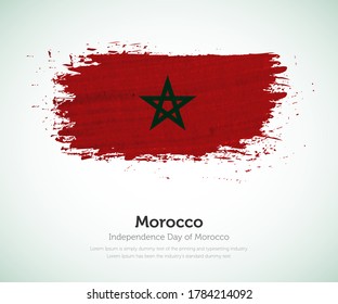 Independence day of Morocco country. Abstract flag in shape of paint brush stroke with shiny colored background