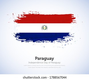 Independence day of Paraguay country. Abstract flag in shape of paint brush stroke with shiny colored background
