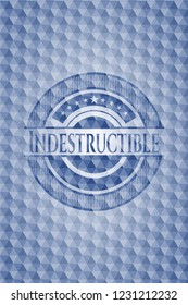 Indestructible blue badge with geometric background.
