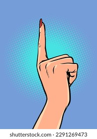 Index finger of a girl with a manicure. Womans finger pointing up.