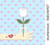 Index finger and thumb picking white rose with thorn for love. A man is giving white rose to show his pure love and he has heart tattoo with word Love you on his arm.