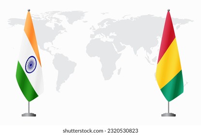 India and Guinea flags for official meeting against background of world map.