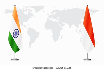 India and Indonesia flags for official meeting against background of world map.