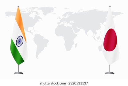 India and Japan flags for official meeting against background of world map.