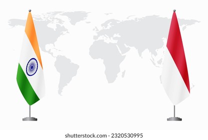 India and Monaco flags for official meeting against background of world map.