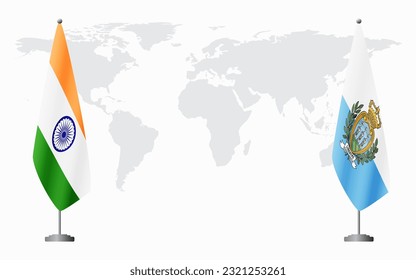 India and San Marino flags for official meeting against background of world map.