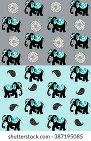 India. Seamless pattern with elephants, paisley and doodle flowers. Vector illustration.