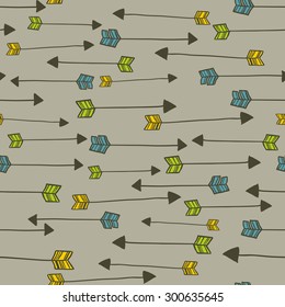 Indian arrows seamless pattern in doodle style. Vector vintage background.