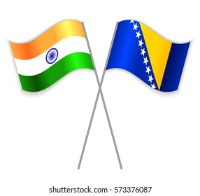 Indian and Bosnian crossed flags. India combined with Bosnia and Herzegovina isolated on white. Language learning, international business or travel concept.