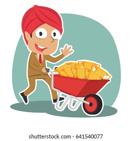 indian businessman carrying trophies on wheelbarrow