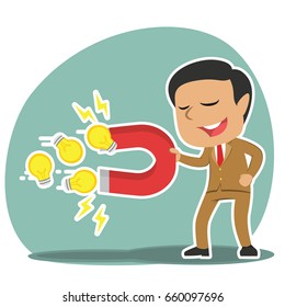 indian businessman using magnet to attract ideas
