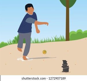 Indian Childhood village game Lagori or Pithu. Boy hitting stones with ball.