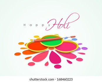 Indian color festival Holi concept with colors on beautiful floral background. 