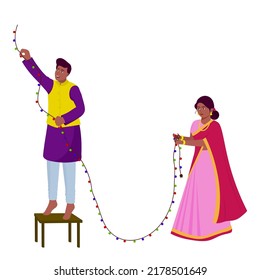 Indian Couple Decorating From Lighting Garland On White Background.
