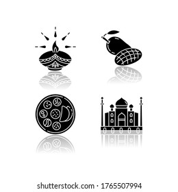 Indian culture drop shadow black glyph icons set. Traditional diya. Diwali festival. Mango fruit. Tropical food. Thali dish. Chapati bread. Taj Mahal. Isolated vector illustrations on white space