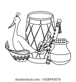 indian drum with candle and peacock