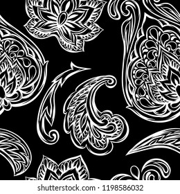 Indian ethnic seamless pattern. Ethnic folk ornament. Hand drawn lotus flower and paisley.