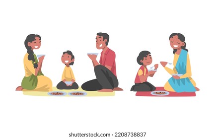 Indian Family with Little Kids Sitting on the Floor Having Meal Together Vector Set