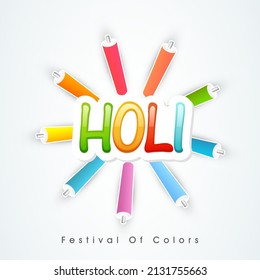 Indian festival of colours, Happy Holi concept with stylish text and colourguns(pichkari) on white background. 