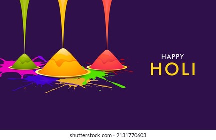 Indian festival of colours, Happy Holi concept with shiny drycolours(gulal) and colour stains against blue colour background.