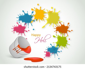 Indian festival of colours, Happy Holi concept with liquid colour spilling from bucket and colour stains.