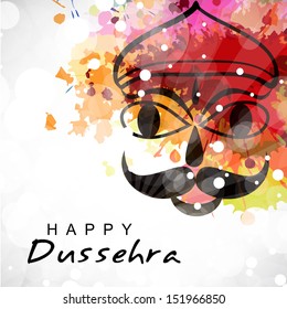 Indian festival Dussehra concept with illustration of Ravana face on colorful grungy background.