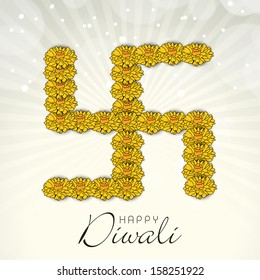 Indian festival Happy Diwali concept with swastik symbol made by flowers on rays background. 
