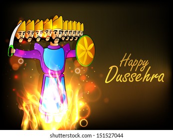 Indian festival Happy Dussehra background with statue of Ravana with his ten heads in fire.