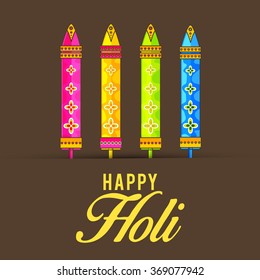 Indian festival Happy Holi celebrations with decorated pichkari.