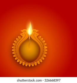Indian Festival of Lights, Happy Diwali celebration with creative illuminated lit lamp and space for your message on shiny background.