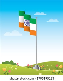 Indian flag having ashoka chakra flying on green landscape