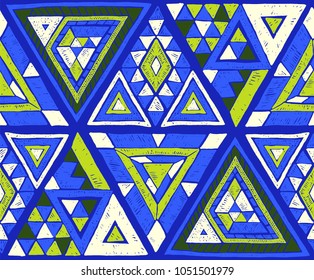 Indian geometric folklore ornament with  triangle. Tribal ethnic vector patchwork texture.  Scandinavian embroidery. Seamless striped  pattern in Aztec style. Gypsy, Mexican, folk pattern. 