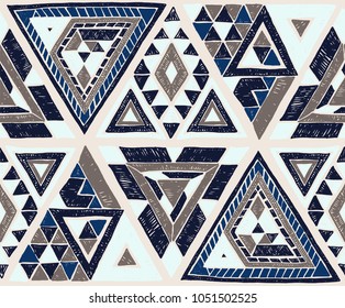 Indian geometric folklore ornament with  triangle. Tribal ethnic vector patchwork texture.  Scandinavian embroidery. Seamless striped  pattern in Aztec style. Gypsy, Mexican, folk pattern. 