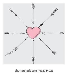 Indian hand-drawn arrows. Arrows in the boho style. Images of different types of arrows flying toward the heart.
