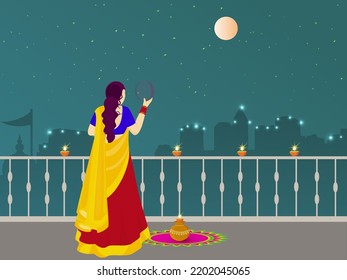 Indian Hindu Festival Karwa Chauth Concept with Young Indian Woman Performing Ritual in the Full Moon Night.