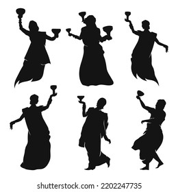 Indian hindu man and women wearing traditional cloth Celebrating Durga puja silhouette by dancing Dhunuchi
