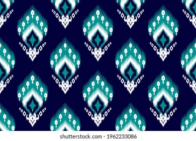 Indian ikat seamless pattern design. Geometric ethnic native tribal boho Aztec fabric carpet mandala African American chevron textile decoration. Silk cotton texture vector illustrations background.