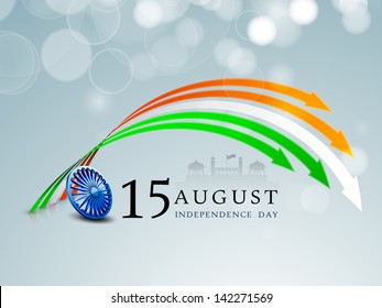 Indian Independence Day background with 3D ashoka wheel and arrows in national flag colors.