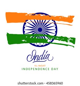 Indian Independence Day concept with Ashoka wheel, handwritten word India and brush strokes in national flag colors. Vector Illustration.