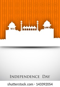 Indian Independence Day concept with red fort on orange and grey background and text Independence Day.