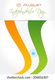 Indian Independence Day greeting card design with tri-colour flag and ashoka wheel.